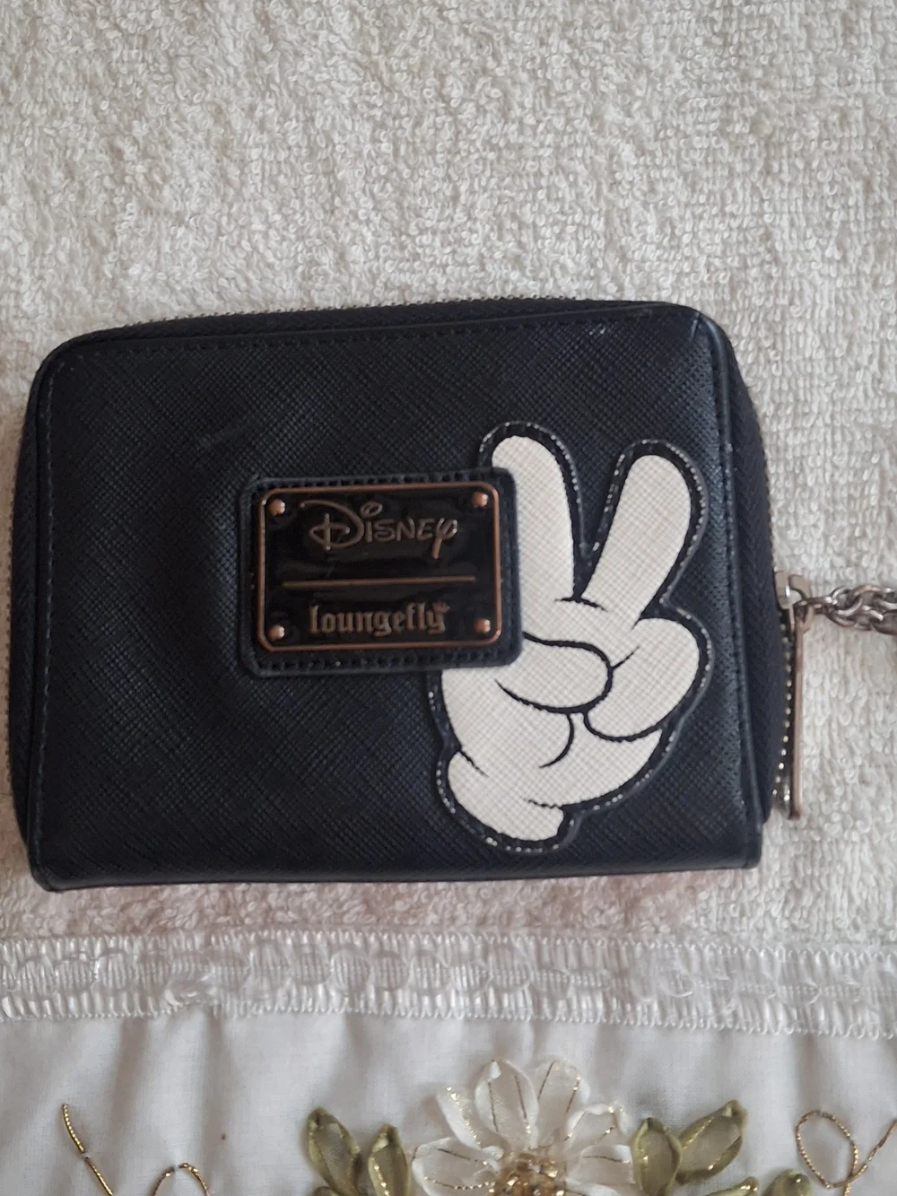 Disney Loungefly zip-around wallet featuring a white Mickey Mouse gloved hand